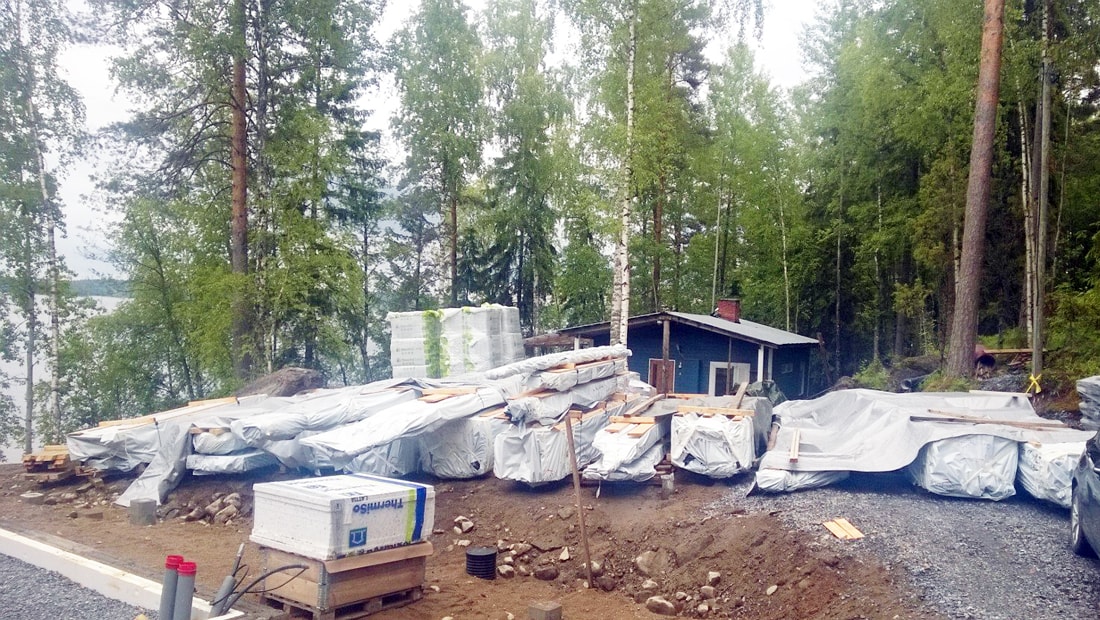 pyramid house finland construction site lake forest cabin