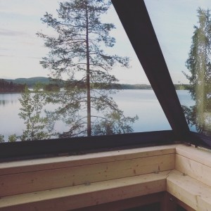 pyramid house finland wood architecture glass view lake